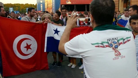 Multicultural fans from all the world different ethnicity taking photo together Stock Footage 91634335
