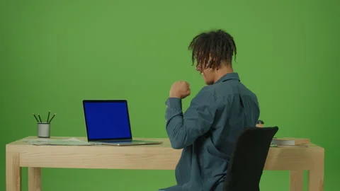 Multicultural Freelancer Student Typing on Blue Screen Laptop Working Online Stock Footage 219757358