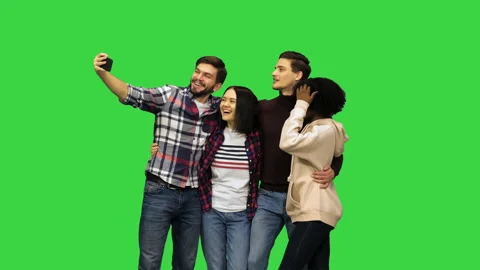 A multicultural group of friends taking a selfie, one of the guys making rabbit Vídeo Stock 150215857