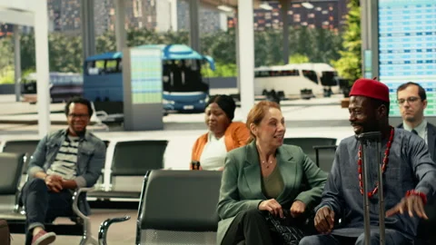 Multicultural group of passengers colliding and hurrying in bus stop Stock Footage 334729830