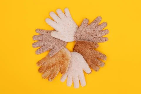 Multicultural hands circle concept made from bread Stock Photos