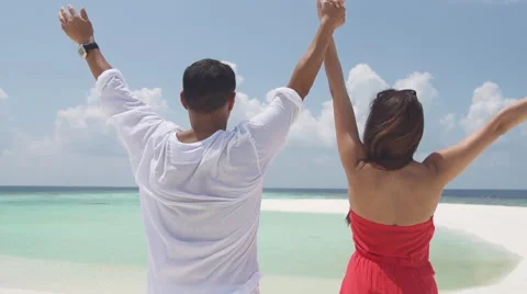 Multicultural Honeymoon Couple Embraces Lovingly On Romantic Island Of Maldives Stock Footage 45590811