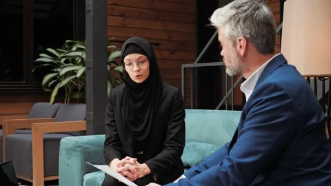 Multicultural Meeting in Modern Office Between Banker and Emirati Businesswoman. Video stock 232491703