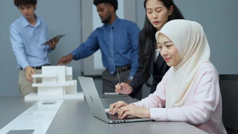 Multicultural Office Team Engaged in Project Work Stock Footage 285790686