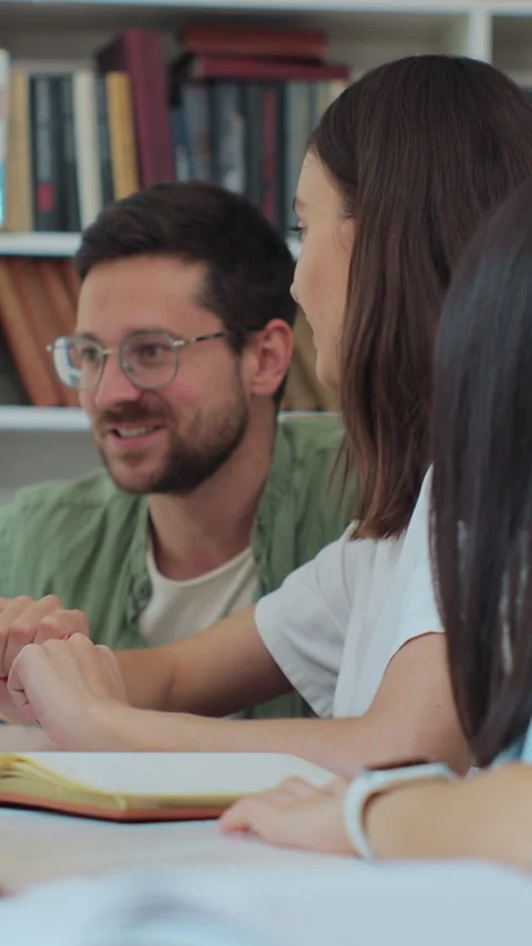 Multicultural students study for exams as a team, use computer Stock Footage 345148037