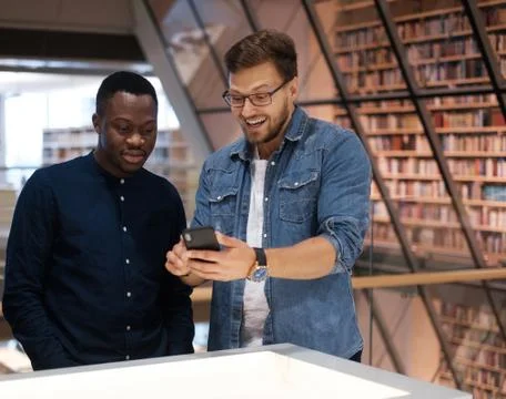 Multicultural stundets in a public library Photos
