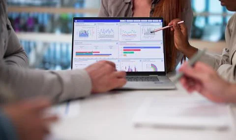 Multicultural Team Analyzing Demographic Data For Financial Predictions In Of Stock Photos
