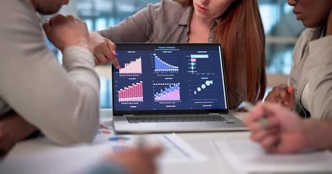 Multicultural Team Analyzing Financial Data On Virtual Dashboard In Office Stock Photos