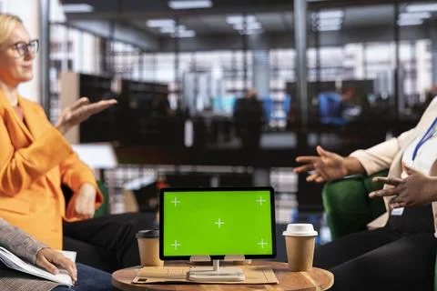 Multicultural team of specialists using mockup copy space in the office Stock Photos