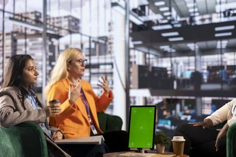 Multicultural team of specialists using mockup copy space in the office Stock Photos