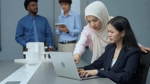 Multicultural Women Collaborating at Work Stock Footage 285792844