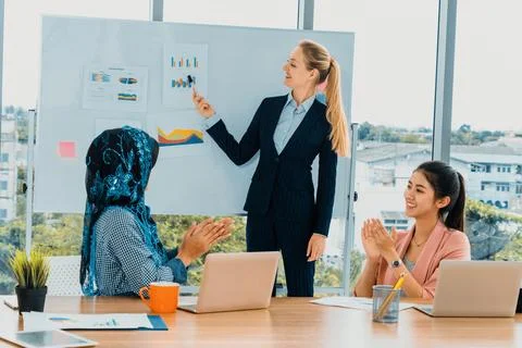 Multicultural working group in teamwork meeting. uds Stock Photos