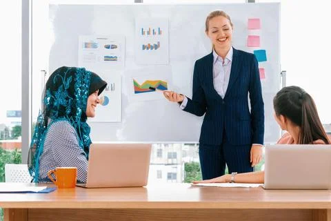 Multicultural working group in teamwork meeting. uds Stock Photos