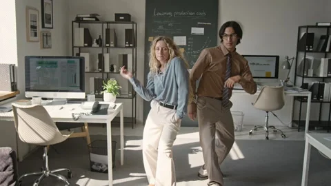 Multiethnic Business Colleagues Dancing in Office Stock Footage 345229438