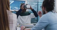 Multiethnic Business Team Using Virtual Reality Headset In Office Meeting Stock Footage