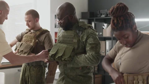 Multiethnic Cadets Putting on Tactical Gear During Training Vídeos de archivo 257794197