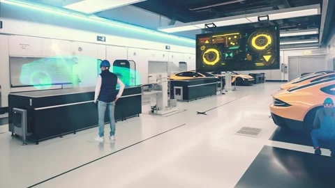 Multiethnic Car Factory Engineer in Work Uniform Using Tablet Computer Stock Footage 244056821