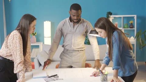 Multiethnic colleagues discussing project. Stock Footage 228804778