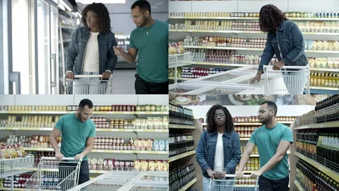 Multiethnic couple talking while walking along aisles Stock Footage 130020005