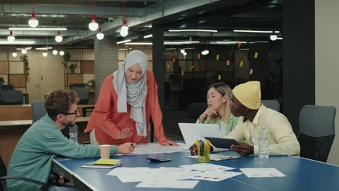Multiethnic creative business team working on a project. Stock Footage 209175253