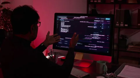 Multiethnic Cybersecurity Analysts Reacting to Cyber Attack Stock Footage 347308440