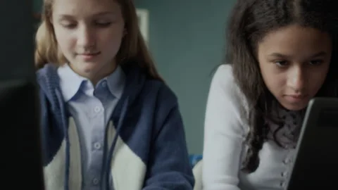 Multiethnic Female Classmates Assembling Wired Circuit Board in Class Stock Footage 284436381
