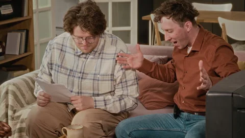 Multiethnic Friends Having Fun and Laughing during Game Night at Home Stock Footage 340273481