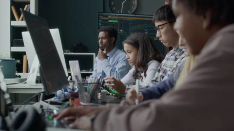Multiethnic Gen Z Students Having Robotics and Coding Lesson in Class Stock Footage 284438357