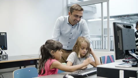 Multiethnic girls trying to cope with task on computer science. Stock Footage 153833854