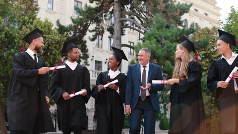 Multiethnic graduates students walking all together in front for the camera Stock Footage 167091829
