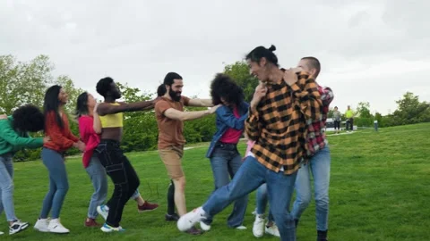 Multiethnic group of diverse friends having fun dancing together outdoor Stock Footage 196472422