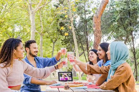Multiethnic group doing a video conference zoom during Christmas party Stock Photos