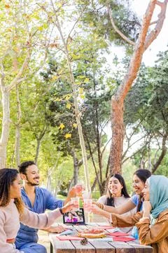 Multiethnic group doing a video conference zoom during Christmas party Stock Photos