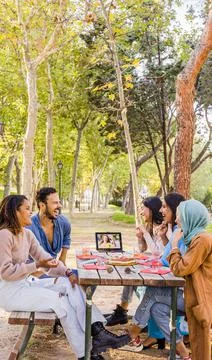 Multiethnic group doing a video conference zoom during Christmas party Stock Photos