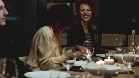Multiethnic group of friends attending a dinner party. Stock Footage 61157902