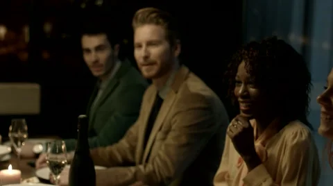 Multiethnic group of friends having dinner together. Stock Footage 61157648
