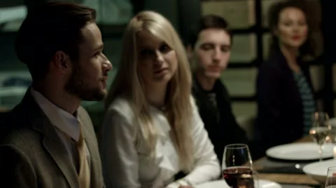 Multiethnic group of friends having dinner together. Stock Footage 61157959
