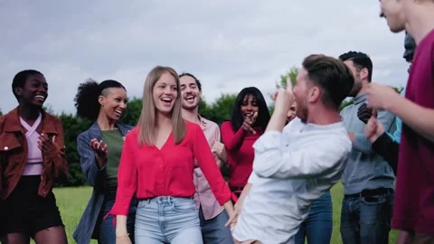 Multiethnic group of friends having fun dancing together outdoor Stock Footage 196180243