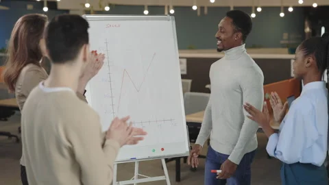 Multiethnic group of people clapping hands in office Video stock 195416318