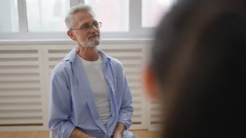 Multiethnic group of people sharing their problems during support group meeting Stock Footage 232295185