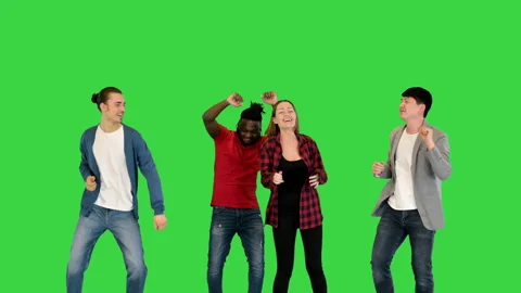 Multiethnic group of young friends dancing on a Green Screen, Chroma Key. Stock-Footage 157353892