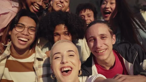 Multiethnic group of young friends taking a selfie. and having fun.The focus is Stock Footage 208960974