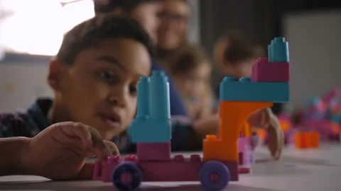 Multiethnic kids playing with constructor at class Stock Footage 100048233