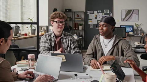 Multiethnic Male Programmers Fist Bumping during Collaborative Work Stock-Footage 336713503