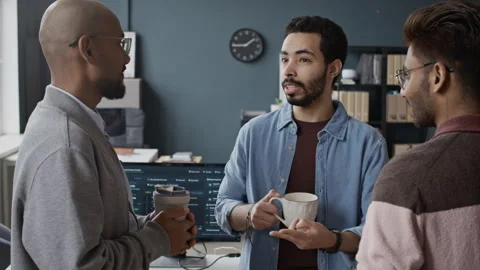 Multiethnic Male Programmers Talking during Coffee Break in IT Office Stock-Footage 337483065
