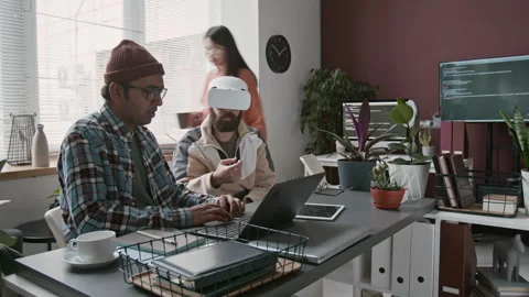 Multiethnic Male Software Developers Collaborating on AR Project in Office Stock Footage 285705618