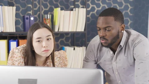 Multiethnic office workers working at computer. Stock Footage 228805492