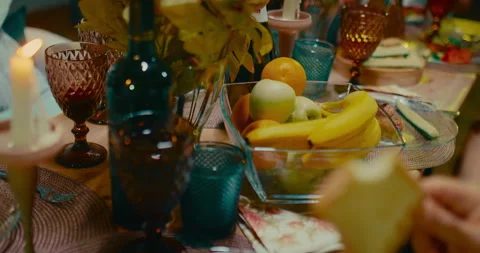 Multiethnic people dining in patio in summer evening, closeup of table with Stock-Footage 252115998