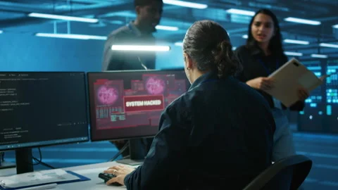 Multiethnic programmer team in server farm workspace surprised by hacking attack 스톡 동영상 276194661