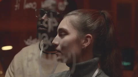 Multiethnic Programmers Developing Computer Command at Night Office Stock Footage 259165155